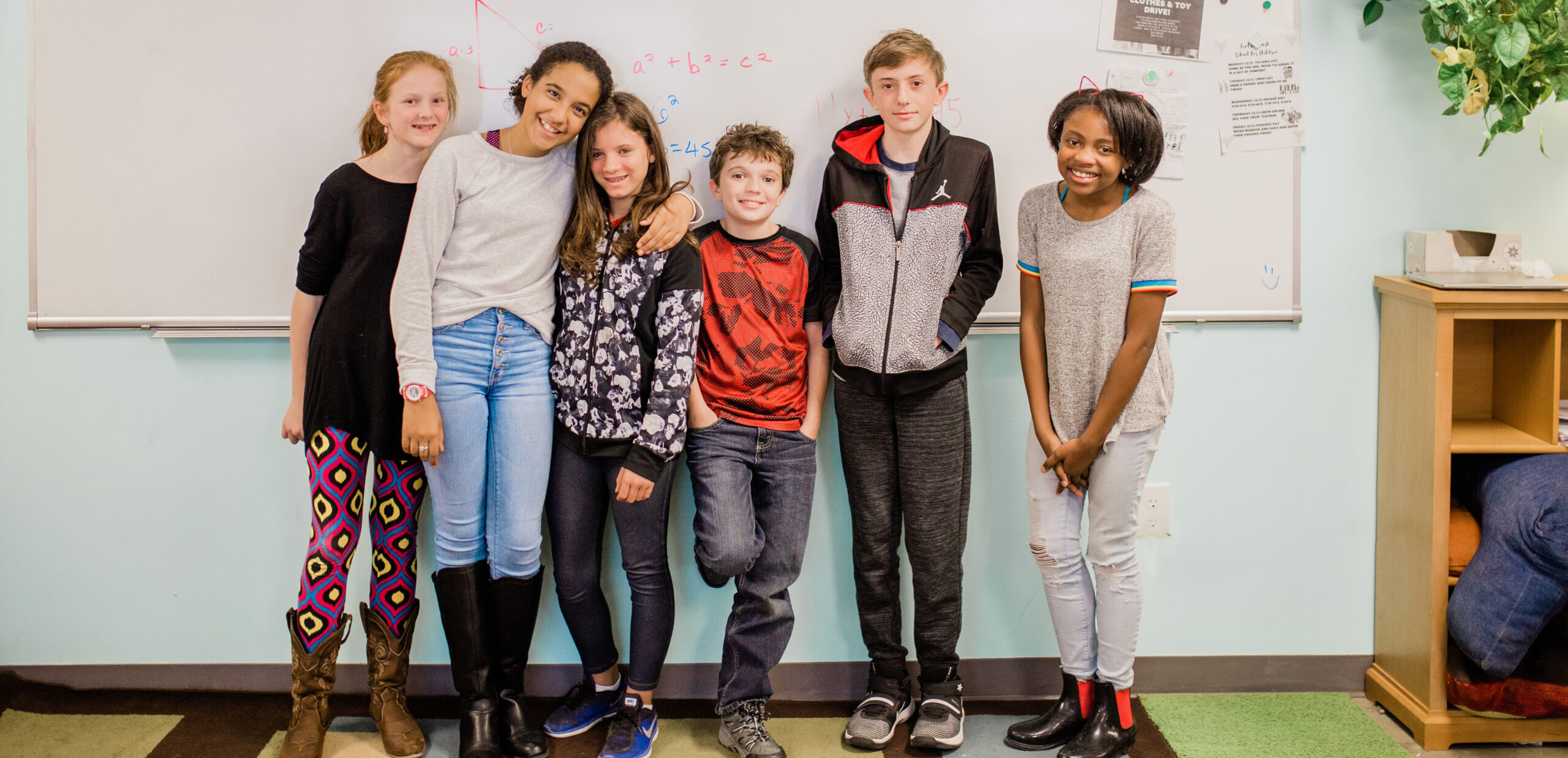 A group of children smiling